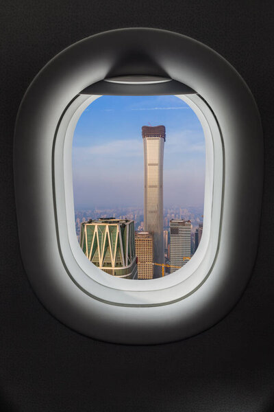 Beijing China in airplane window - travel background