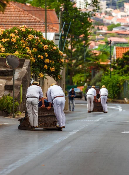 Toboggan riders on sledge in Monte - Funchal Madeira Portugal — Stock Photo, Image