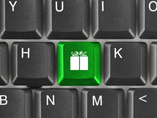 Computertastatur mit Geschenkschlüssel — Stockfoto