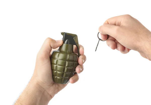 Hand pulls a check from a grenade — Stock Photo, Image