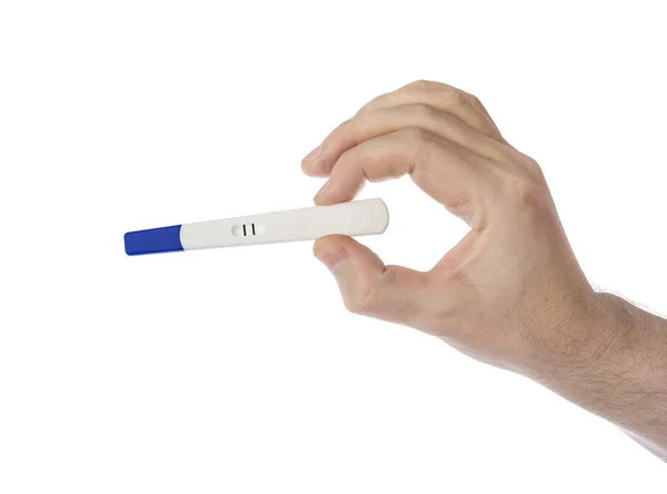 Mão com teste de gravidez — Fotografia de Stock