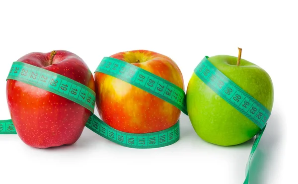 Яблука і вимірювальна стрічка — стокове фото