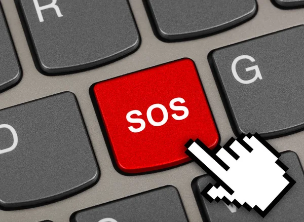 Клавиатура компьютера с клавишей SOS — стоковое фото