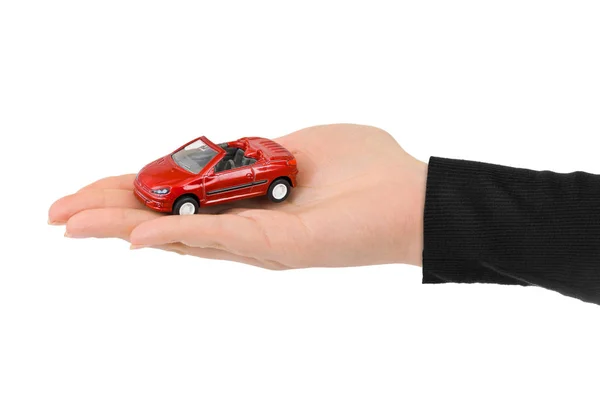 Hand en speelgoed auto — Stockfoto