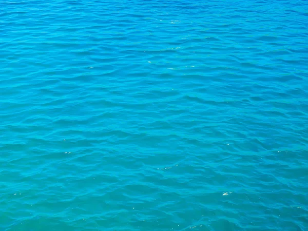 Azul tranquilo fundo de água do mar . — Fotografia de Stock