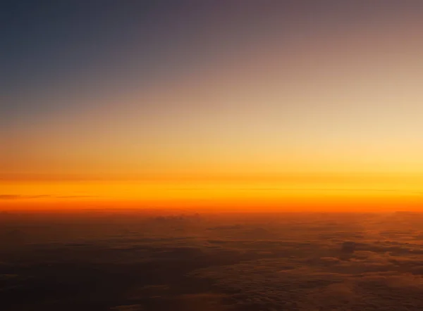 Colorful dusk sky from the plane. — Stock Photo, Image