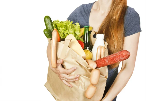 Kadın eli ürünlerle birlikte çanta — Stok fotoğraf
