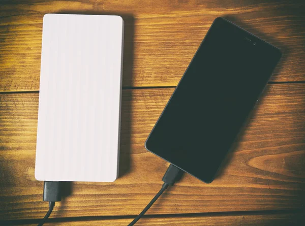Power bank and smartphone — Stock Photo, Image