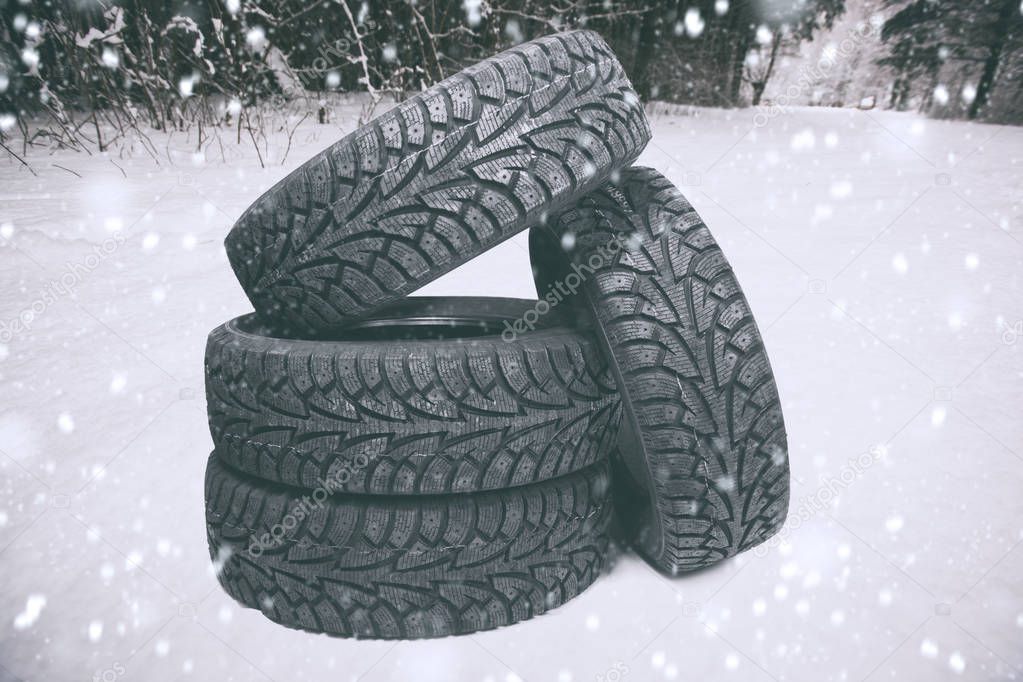 Four new tires on snow in the park