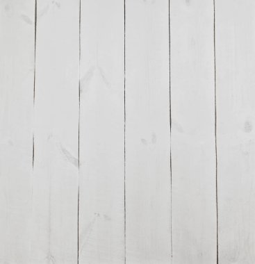 Boş tahta beyaz masa. Boyalı tahtaların arka planı