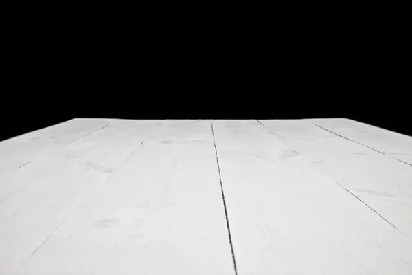 Der leere weiße Holztisch. der Hintergrund aus bemalten Planken — Stockfoto