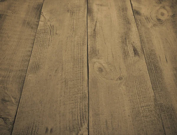Prázdný dřevěný hnědý stůl. Pozadí z malovaných prken — Stock fotografie