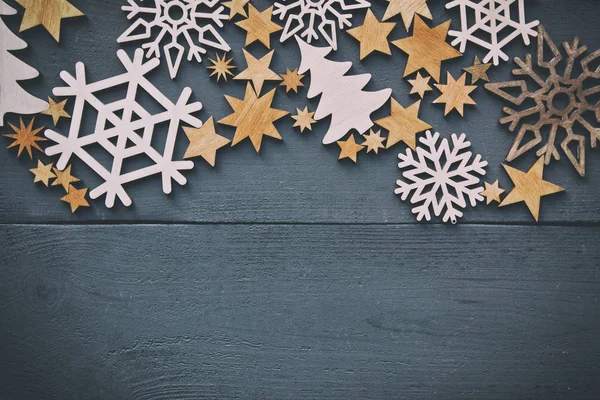 The beautiful christmas background with lots of small wooden dec — Stock Photo, Image