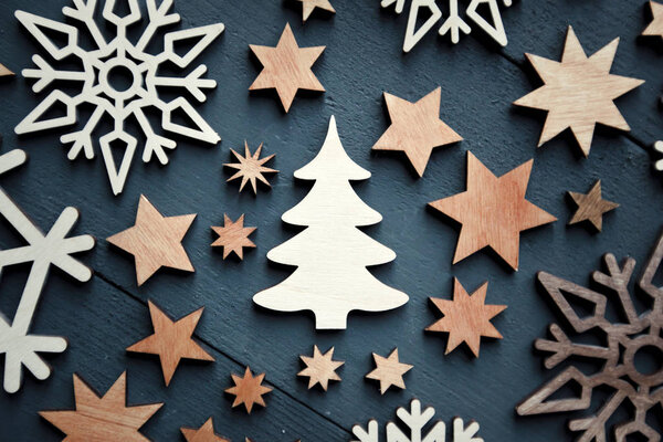 The beautiful christmas background with lots of small wooden dec