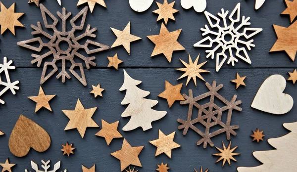 Krásné vánoční pozadí se spoustou malých dřevěných výparů — Stock fotografie