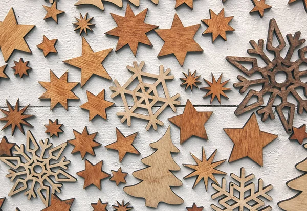 The beautiful christmas background with a lot of small wooden de — Stock Photo, Image