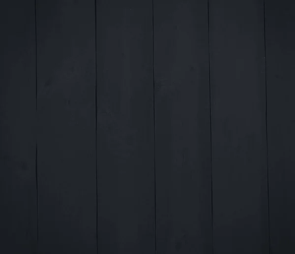 De lege houten zwarte tafel. De achtergrond van beschilderde planken — Stockfoto