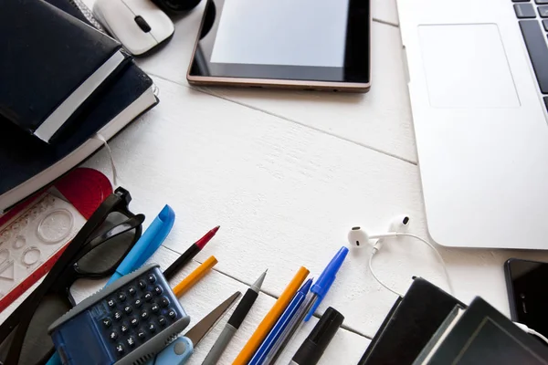 A lot of different education supplies on the wooden table — ストック写真