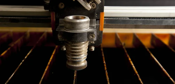 Close-up view of laser cutting machine