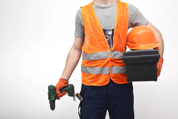 Der Arbeiter Uniform Mit Dem Werkzeugkasten Der Hand Auf Dem — Stockfoto