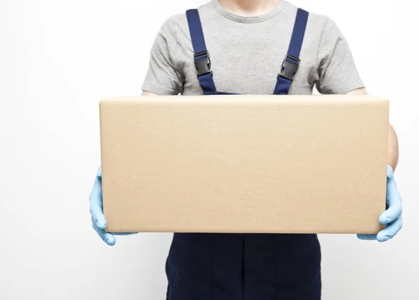 Courier Holding Carton Box His Hand Wearing Protective Latex Gloves — Stock Photo, Image