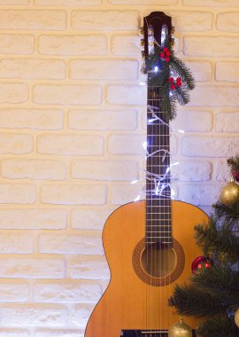 Country Müzik Noel arka plan ile gitar tuğla duvar