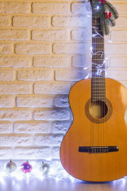 Tuğla duvar Noel akustik gitarda tasarımı için.