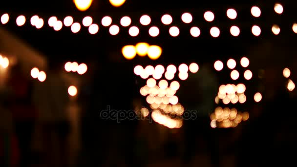 Beautiful bokeh. Festival lights in blur. — Stock Video