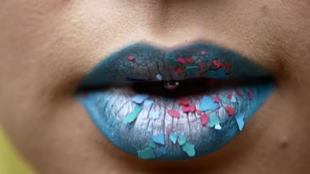 Beautiful and sexy female lips with expensive makeup. Close-up of painted female lips — Stock Video