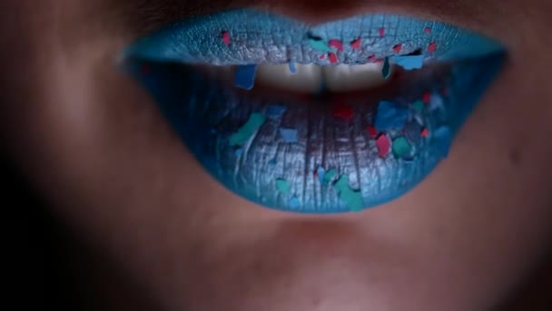 Beautiful and sexy female lips with expensive makeup. Close-up of painted female lips — Stock Video