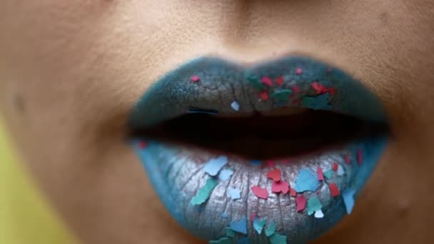 Beautiful and sexy female lips with expensive makeup. Close-up of painted female lips — Stock Video