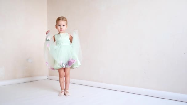 A cute girl is in her ballet uniform dancing — Stock Video