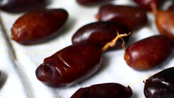 Dates lie on a baking sheet and dry — Stock Video