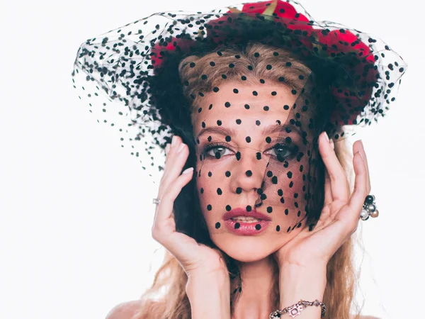 Portrait of a beautiful girl with a black veil in front of her eyes. — Stock Photo, Image