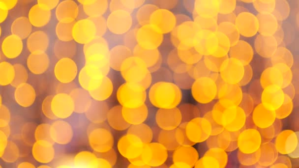 Abstract background from a garland. Yellow bokeh circles — 图库视频影像