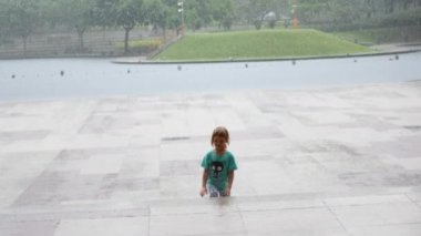 Girl runs from the rain 
