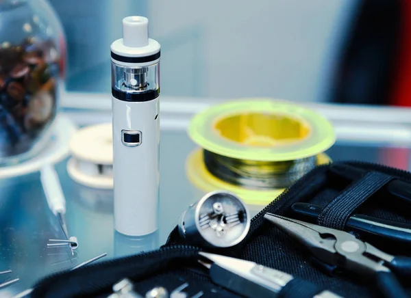 Vape shop with modern vaping device spare parts — Stock Photo, Image