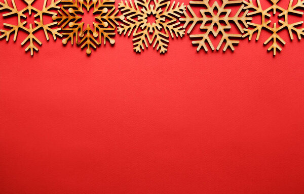 Winter holidays background with handmade wooden elements