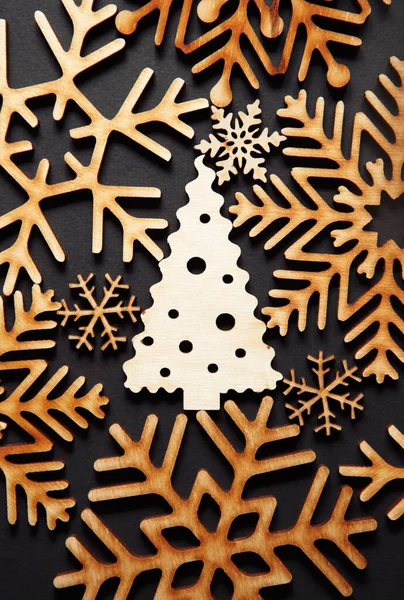 Zimowe wakacje tło z ręcznie robionych elementów drewnianych — Zdjęcie stockowe