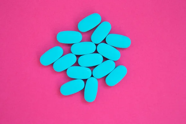 Blue Medical Pills Flat Lay Pink Background Pile Chemical Drugs — стоковое фото