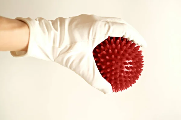 Mänsklig Hand Handske Håller Covid Viruset Vit Bakgrund Koncept Design — Stockfoto