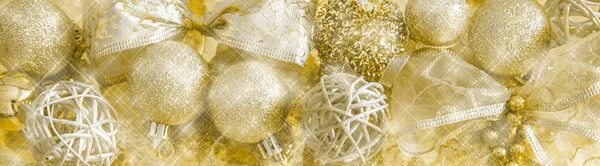 Kopfteil mit goldener Weihnachtsdekoration und glitzerndem Hintergrund — Stockfoto