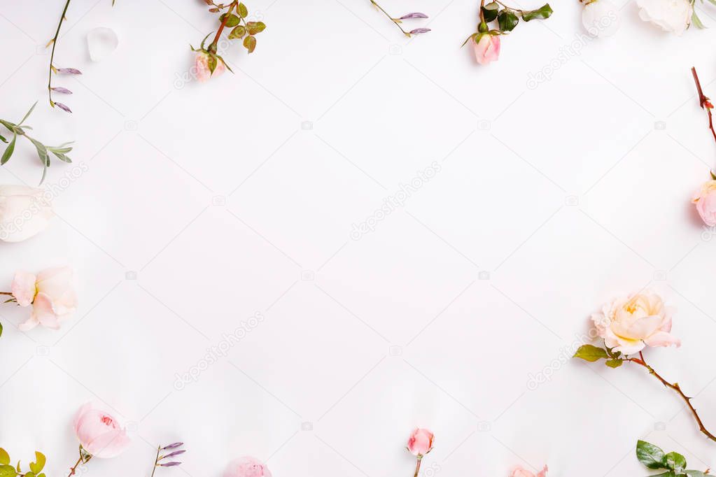 Festive flower composition on the white wooden background. Overhead view