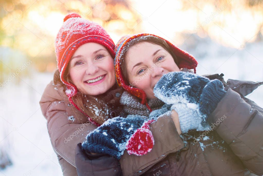 Winter Lifestyle Concept - Girls Having Fun in Park