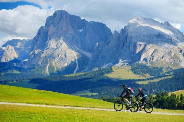 Tourists cycling in Seiser Alm