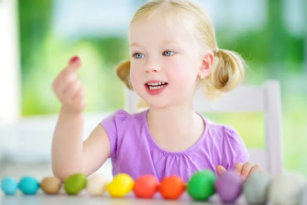 Girl having fun with modeling clay — Stock Photo, Image