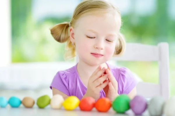 Girl having fun with modeling clay — Stock Photo, Image