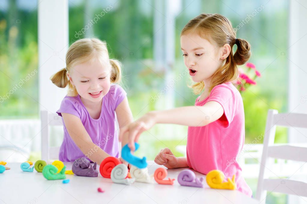 sisters doing snails figures