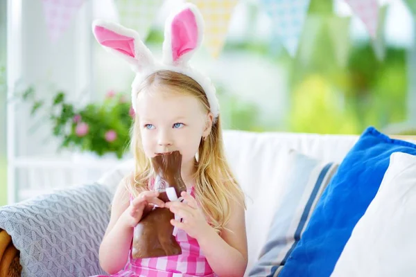 little girl wearing bunny ears