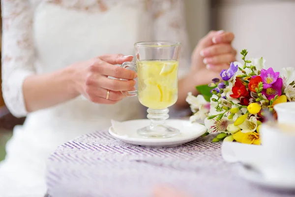 Woman drinking hot ginger tea — Stock Photo, Image